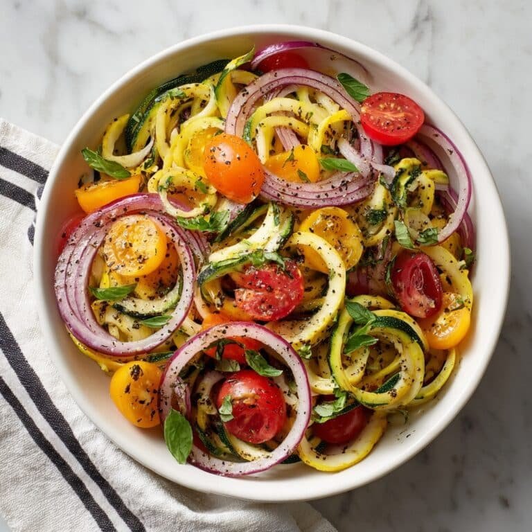 Zucchini Noodle Salad with Cherry Tomatoes and Lemon Dressing Recipe
